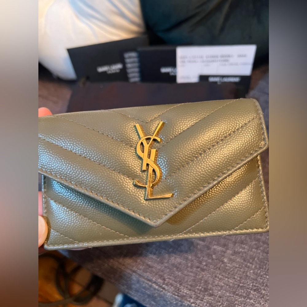 SOLD OFF POSHMARK 
Cassandre YSL Monogram Leather Zip Card Holder - Picture 14 of 16